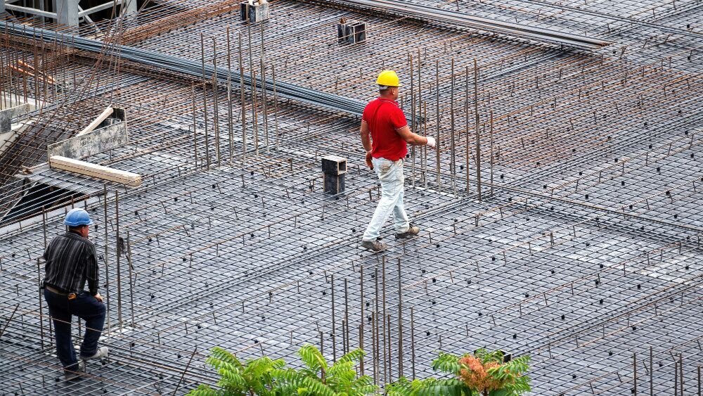 Concrete construction site with workers